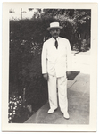 E. W. Bertner Outdoors in White Suit on the Sidewalk by Ernest William Bertner (1889-1950)