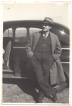 E. W. Bertner Leaning Against a Car by Ernest William Bertner (1889-1950)