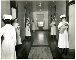 Nurses and Nursing Students In A Hall at Memorial Hospital by Memorial Hospital System