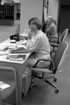 Library Interior Librarian at Desk