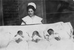Leta Denham, Nursing Student at the Baptist Sanitarium and Hospital Training School for Nurses (later Memorial Hospital), is Pictured with Newborn Babies by Leta Elizabeth Denham (1895-1982)