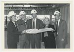 Mrs. Cullen, Dr. Feigin, Unidentified Board Member, Dr. Desmond, and Dr. Williamson Examine Blueprints and Construction of Texas Children's Hospital by Murdina M. Desmond (1916-2003)