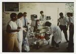 Jefferson Davis Hospital Staff Move Equipment by Jim DeLeon