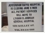 Sign Announcing Jefferson Davis Hospital Closure by Jim DeLeon