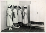 ABCC Nurses Learning to Weigh and Measure at Kure by Atomic Bomb Casualty Commission