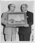 Henry Stubee and Robert V. Moise holding an architecural rendering of the Houston Tuberculosis Association Building