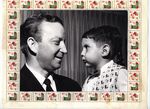 Houston-Harris County Tuberculosis Association 1964 Christmas Seal Chairman Raymond Schindler with a Boy