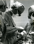 Dr. Denton Cooley Performs A Coronary Bypass by Department of Medical Photography, St.Luke's/ Texas Children's Hospital