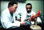 Dr. Cooley And Dr. Norman With Heart Model by Texas Medical Center