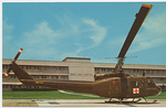 Aerial Ambulance Parked in front of Beach Army Hospital of Fort Wolters, TX (Front) by John P. McGovern Historical Collections & Research Center